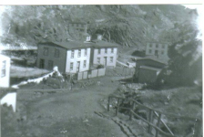 06 The large house was the home of Frank and Phoebe Lockyer, to the right was the home of Edgar and Myrtle Lockyer, across the road was the home of Enos and Mary Lockyer and down the road is the second home of Edgar's. Credit: Madonna Drover